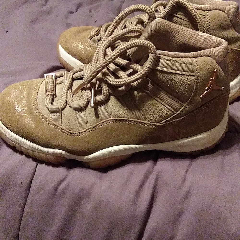 Green and gold Jordan 12s